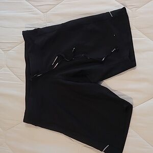 Women's small Nike track short tights.